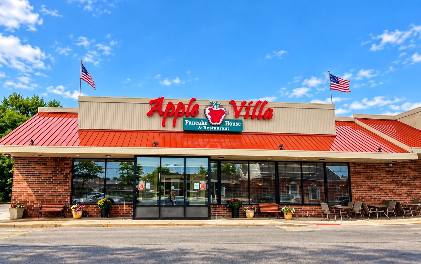 Outside the Apple Villa Pancake House, with the red sign above the entrance